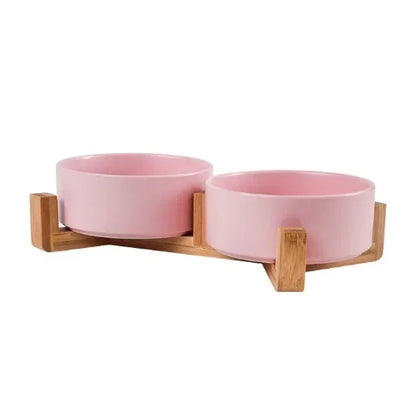 Gamelle en céramique colorée avec support en bois. Adaptée pour les croquettes et l'eau. Convient à tous les petits chiens et les chats. Vendue sur la boutique Mon Petit Chihuahua. Couleur 
rose