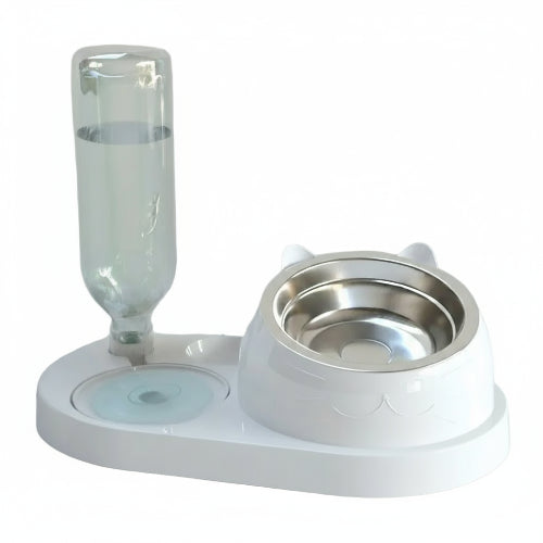 Gamelle double avec bol incliné pour les croquettes et réservoir d’eau. Convient à tous les petits chiens et les chats. Vendue sur la boutique Mon Petit Chihuahua. Couleur blanc