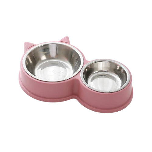 Gamelle double avec deux bols de différents tailles pour les croquettes et l’eau. Convient à tous les petits chiens et les chats. Vendue sur la boutique Mon Petit Chihuahua. Couleur rose