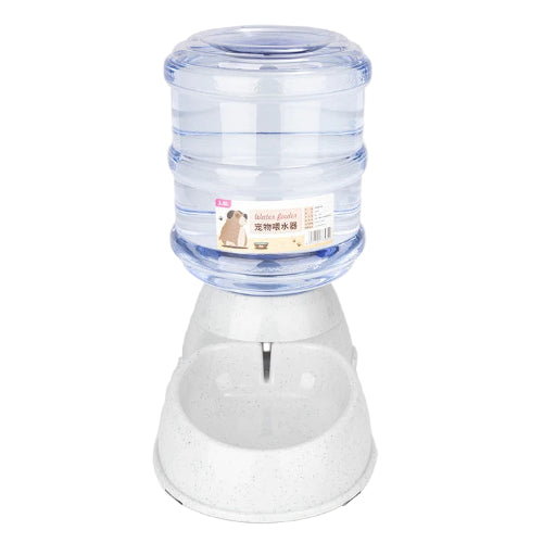 Gamelle distributeur automatique de grande capacité pour l’eau ou les croquettes. Adaptée à tous les petits chiens et les chats. Vendue sur la boutique Mon Petit Chihuahua. Couleur 
blanche