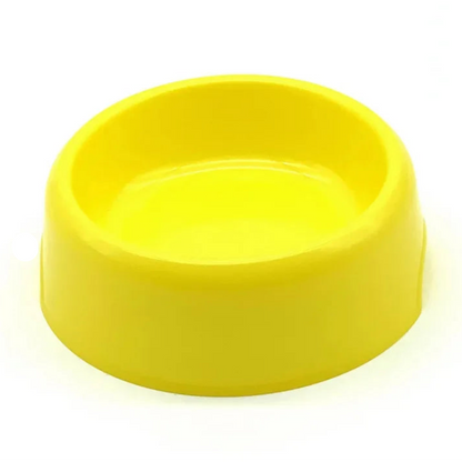 Gamelle simple en plastique résistant, couleur jaune. Adaptée aux petits chiens et aux chats. Vendue sur la boutique Mon Petit Chihuahua. 