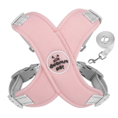 Harnais rose et gris et sa laisse assortie pour petit chien. Réglable et confortable, convient aux petits chiens, chihuahuas, ou aux chats.