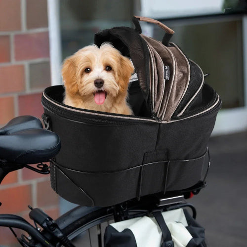 Panier vélo pour petits chiens. Se fixe sur le porte bagages de manière sécurisée. Imperméable, permet de transporter votre chien sur votre vélo. Se porte aussi en bandoulière. Vendu sur la boutique Mon Petit Chihuahua. Convient aussi aux chats.
